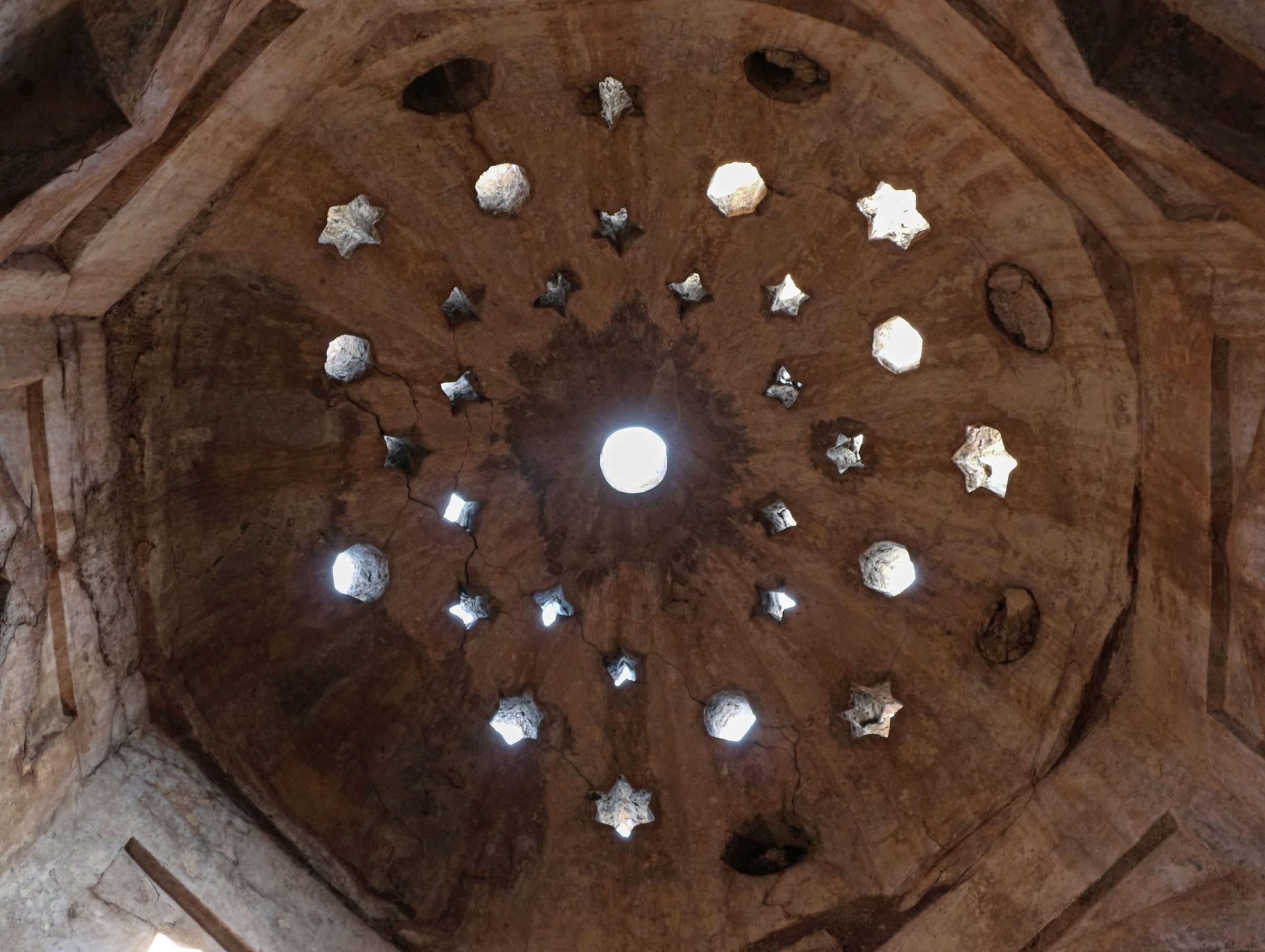 Hammam vault pierced with star apertures, seen from below